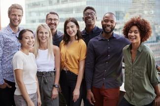 People in a group smiling